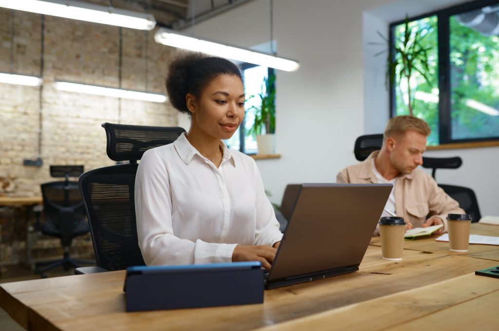 Coworkers talking and planning marketing strategy together