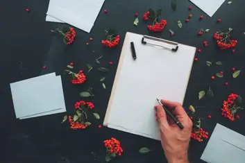 Flat lay hand writing letter