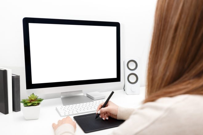 Freelancer or business woman working at her desk