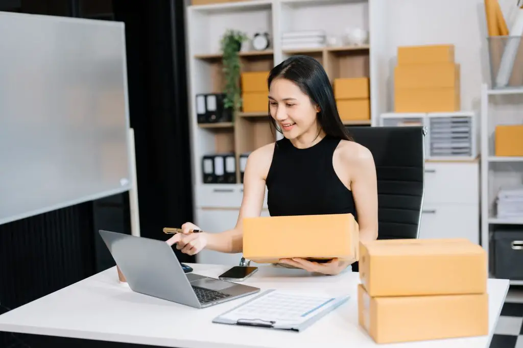 Small business entrepreneur SME freelance woman working at home office, BOX,tablet